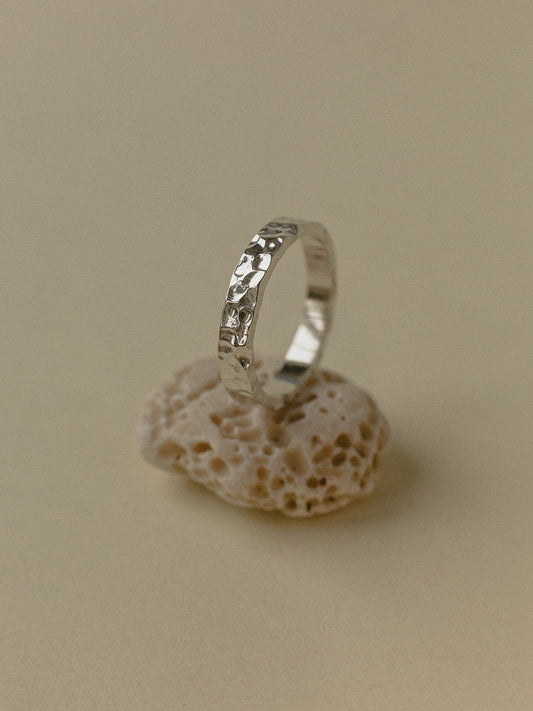 A pair of forged wedding rings