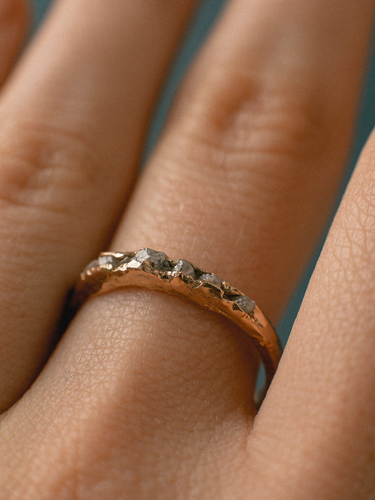 Author's scratched ring with diamonds