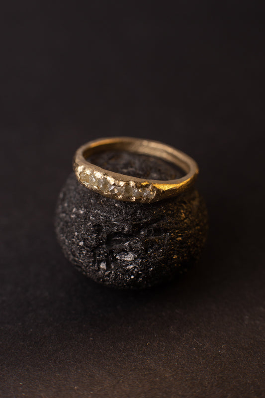 Author's scratched ring with raw diamonds in stock