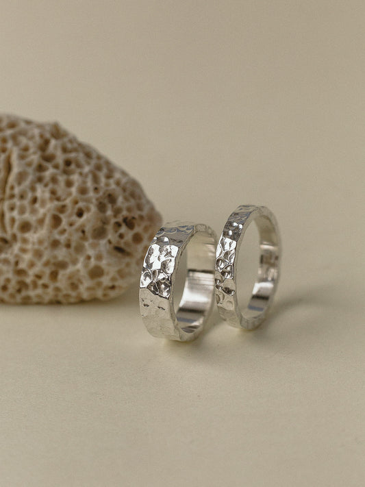 A pair of forged wedding rings