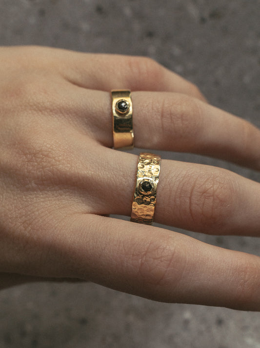 Wide ring with diamond